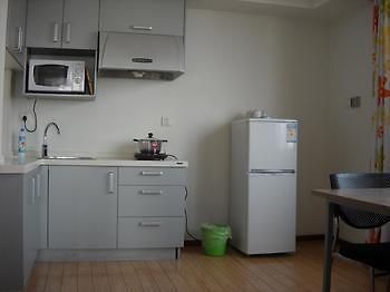 E-Jia Hotel Apartment Hangzhou Fenghua Bagian luar foto